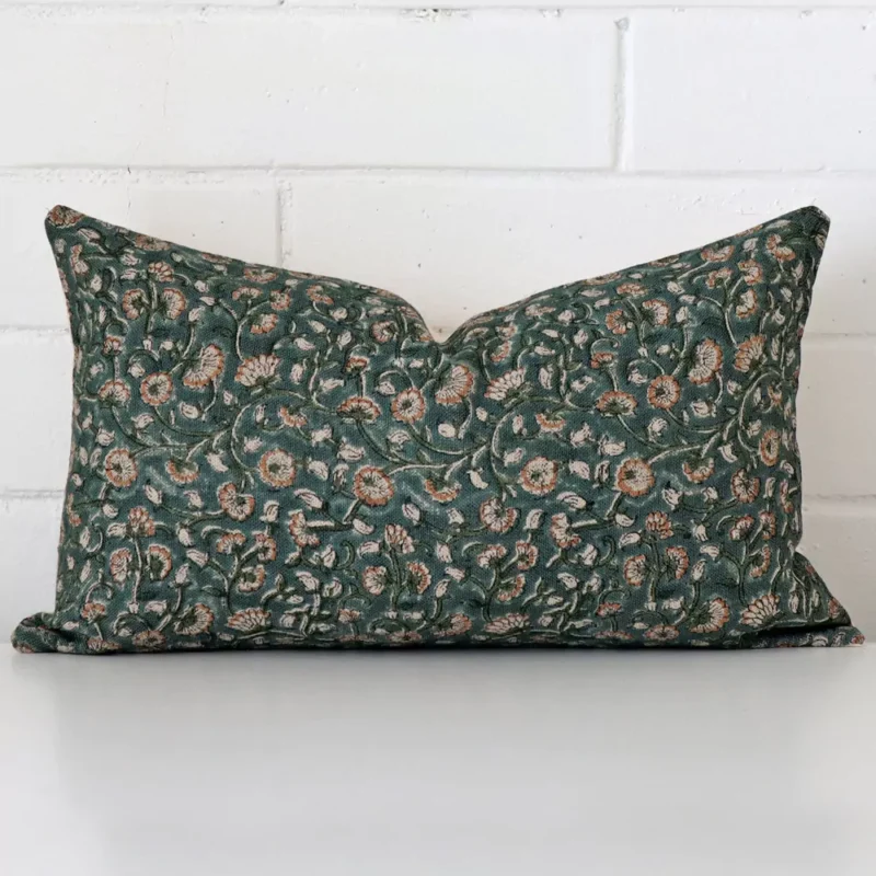 alba-floral-designer-cushion-cover-rectangle-art126-30 Designer cushion cover in front of a white wall. It has a rectangle size and is made from a designer material.