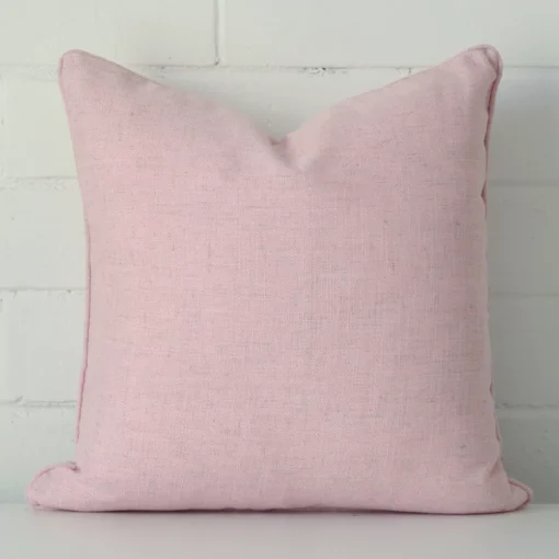 Lovely pink cushion made from linen fabric and in an elegant square size.