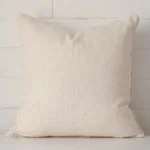 Striking square cream cushion cover made from a linen fabric.