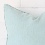 Zoomed in visual of linen square cushion cover in mint.