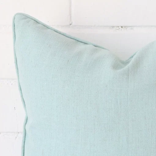 Zoomed in visual of linen square cushion cover in mint.