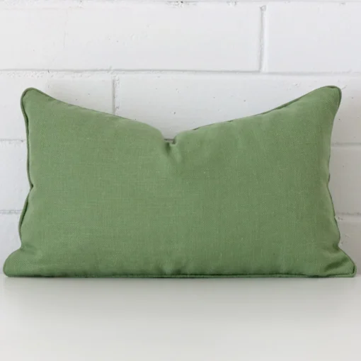 Striking rectangle sage green cushion cover featuring a quality linen fabric.