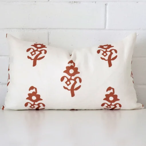 A gorgeous linen rectangle cushion in terracotta.