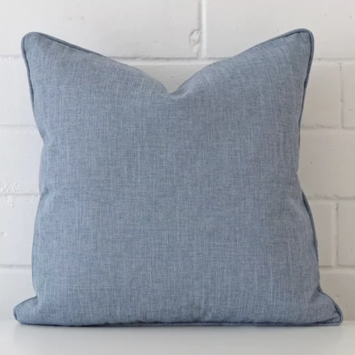 Gorgeous square linen cushion cover that has a blue hue.