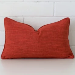 A gorgeous linen rectangle cushion in burnt orange.