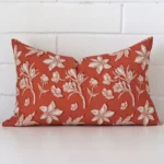 A premium linen rust cushion boasting a floral design and in a rectangle size.