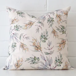 Striking square cushion cover featuring a floral style on quality linen fabric.