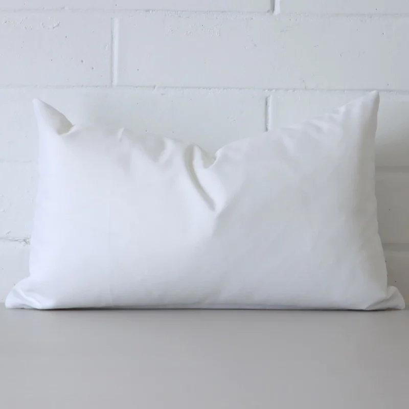 byron-waterproof-white-outdoor-cushion-cover-rectangle-sc949-30 Striking rectangle white cushion cover featuring an outdoor fabric.