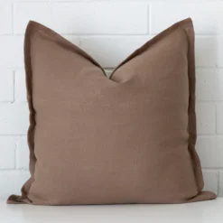 Lovely clay cushion made from linen fabric and in an elegant square size.