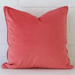 Lovely coral cushion made from velvet fabric and in an elegant square size.