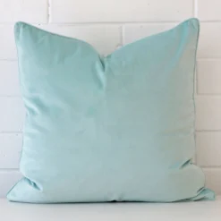 Vibrant velvet cushion cover in a stylish square size with duck egg colouring.