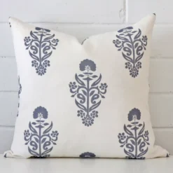 A premium linen cushion boasting a patterned design and in a square size.