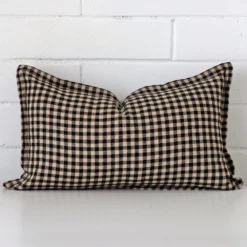 An eye-catching designer rectangle cushion cover. It has a unique gingham style.