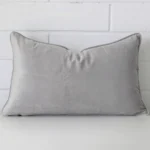 An eye-catching velvet rectangle cushion cover featuring a hue that is flint grey.