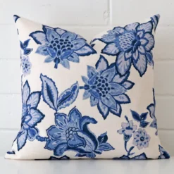 A gorgeous linen square cushion. It has an eye-catching floral design.