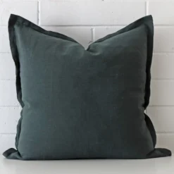 Lovely green cushion made from linen fabric and in an elegant square size.