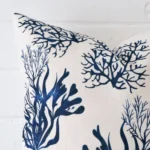 Zoomed in visual of linen square cushion. The intricacies of its patterned design are visible.