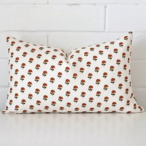 Striking rectangle terracotta cushion cover featuring a floral style on quality linen fabric.
