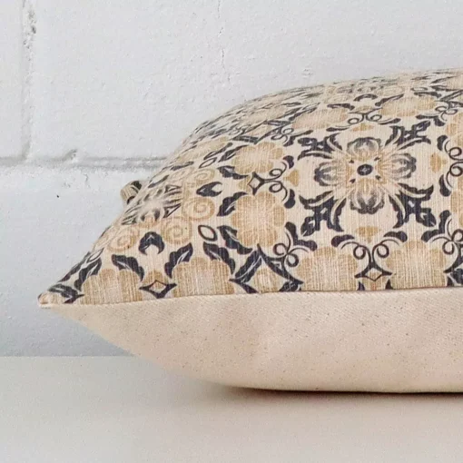 Side angle shot of designer square cushion cover.