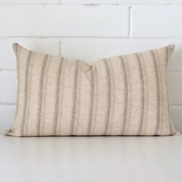 Striking rectangle cushion cover featuring a striped style on quality designer fabric.