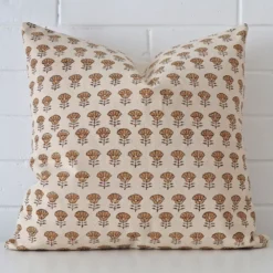 An eye-catching designer square cushion cover. It has a unique floral style.