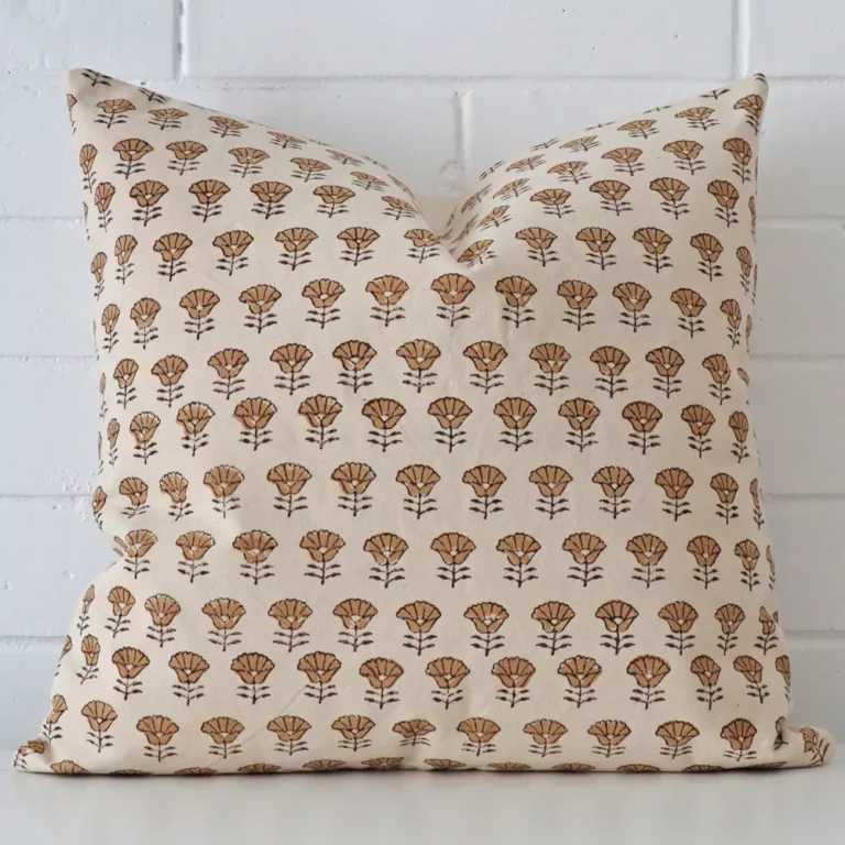 An eye-catching designer square cushion cover. It has a unique floral style.