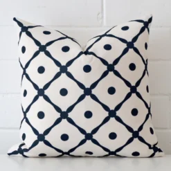 An eye-catching linen square cushion cover featuring a unique geometric style.