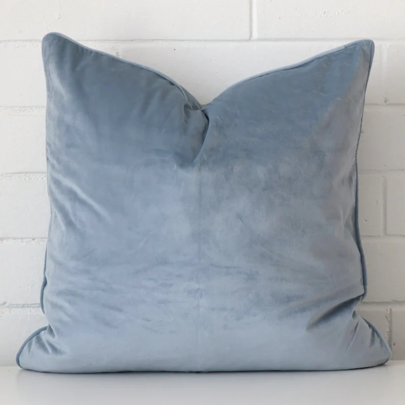 light-blue-velvet-cushion-cover-55cm-x-55cm-sc773-55b Close up image of velvet square cushion. The image allows you to see the light blue hue more thoroughly.