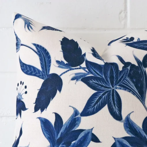 Close up image of linen square cushion. The image allows you to see floral style more thoroughly.