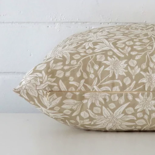 Square linen cushion cover positioned flat to show seams. The floral design are shown between front and rear fabric panels.