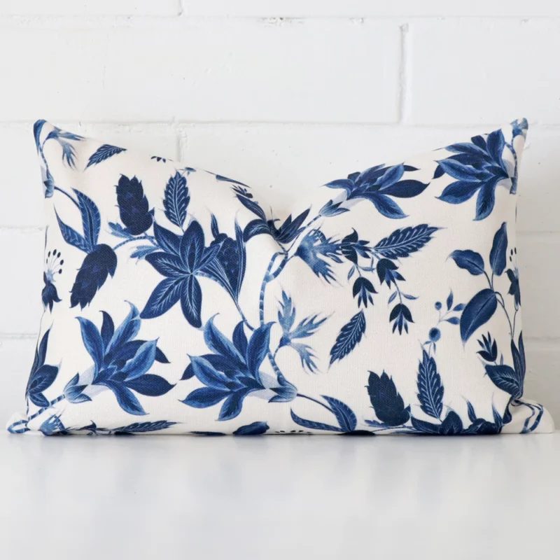 lily-rectangular-hamptons-cushion-cover-30cm-x-50cm-sc619-30b White wall with a cushion laying against it. It has a distinctive linen fabric and has a rectangle shape.