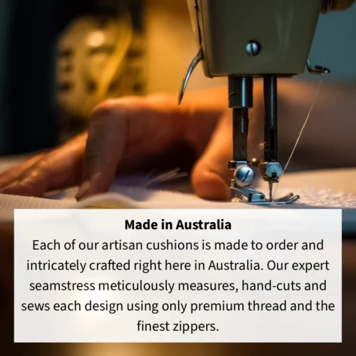 A woman is sewing a made in Australia cushion using a sewing machine.