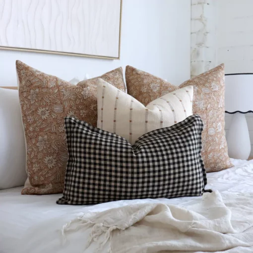 4 designer cushions are shown close up, highlighting their colors and designs with greater detail.
