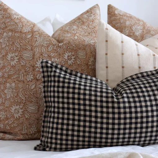 A close up shot showing the 4 designer cushions from Marlow bed cushions set.