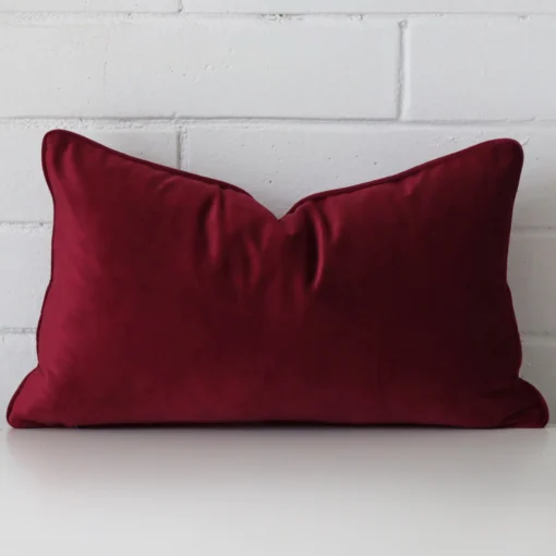A gorgeous velvet Rectangle cushion in maroon.