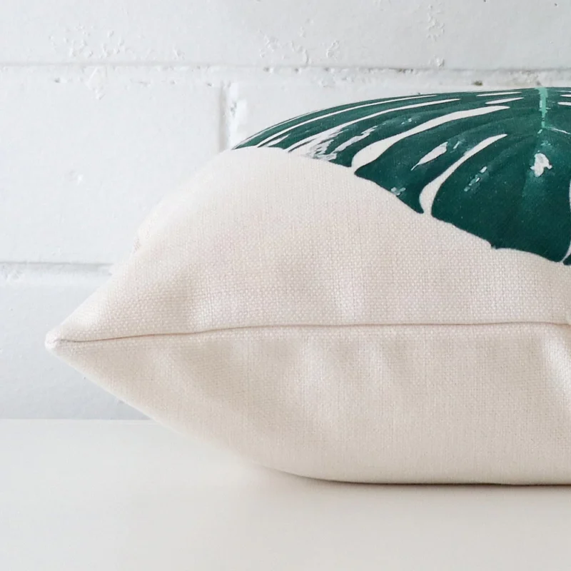Square linen cushion cover positioned flat to show seams. It shows the front and rear fabric panels.