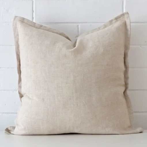 A gorgeous linen square cushion in natural colour..