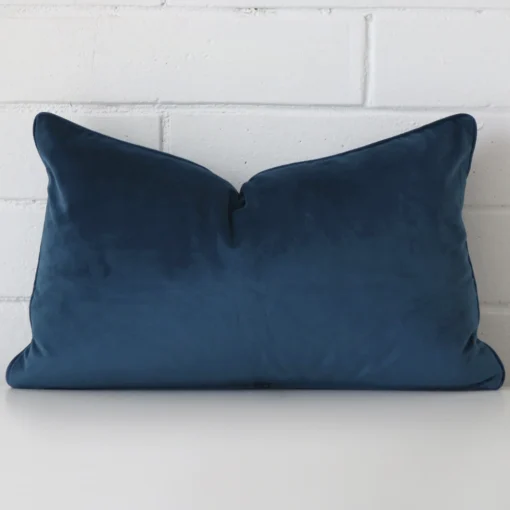 Gorgeous rectangle velvet cushion cover that has a navy hue.