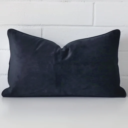 Front view of rectangle cushion. Crafted from a special velvet material in a navy colour.