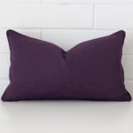 Front view of rectangle cushion. Crafted from a special linen material in a plum colour.