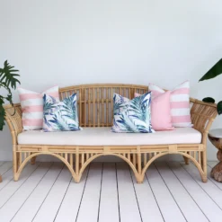 A comfy lounge with 5 soft pink outdoor cushions inviting you to relax and unwind in tranquil surroundings.