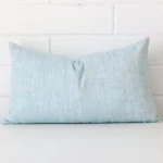 Duck egg cushion cover in front of a white wall. It has a square size and is made from a linen material.