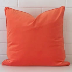 Lovely peach cushion made from velvet fabric and in an elegant square size.