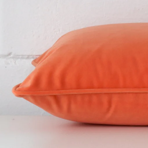 Side shot of rectangle cushion in peach velvet