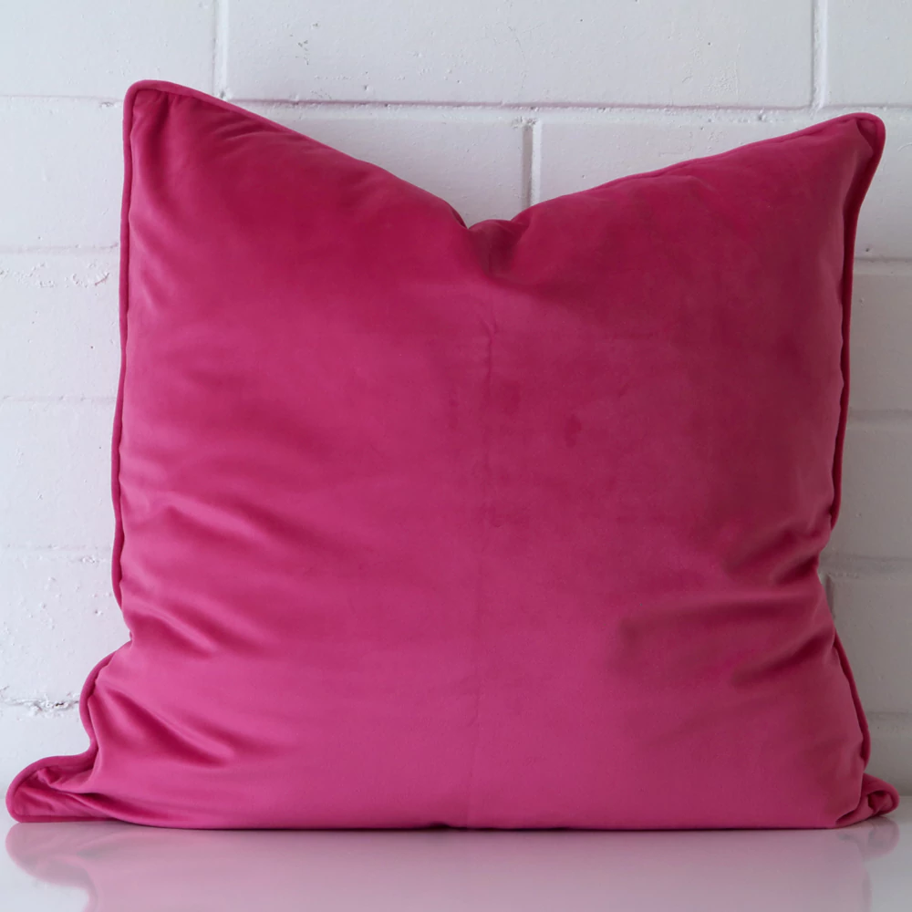Dark pink velvet cushion hotsell