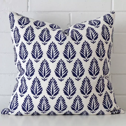 Gorgeous square linen cushion cover that has a blue hue. It has a graceful geometric design.