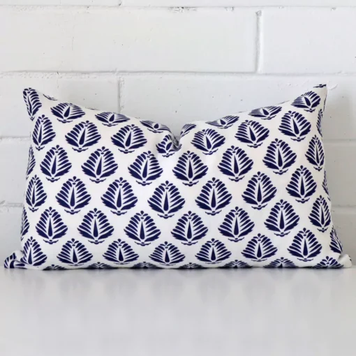 An eye-catching linen rectangle cushion cover featuring a hue that is blue. It has a unique geometric style.
