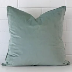 An eye-catching velvet large cushion cover featuring a hue that is spearmint.