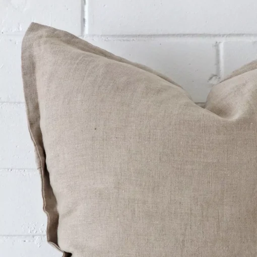 Zoomed in visual of linen square cushion cover in stone colour.