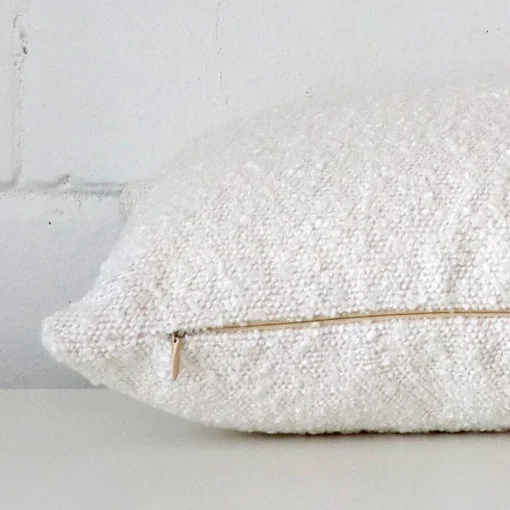 Lateral view of front and back panels of this boucle cushion cover in a rectangle size and with white colouring.